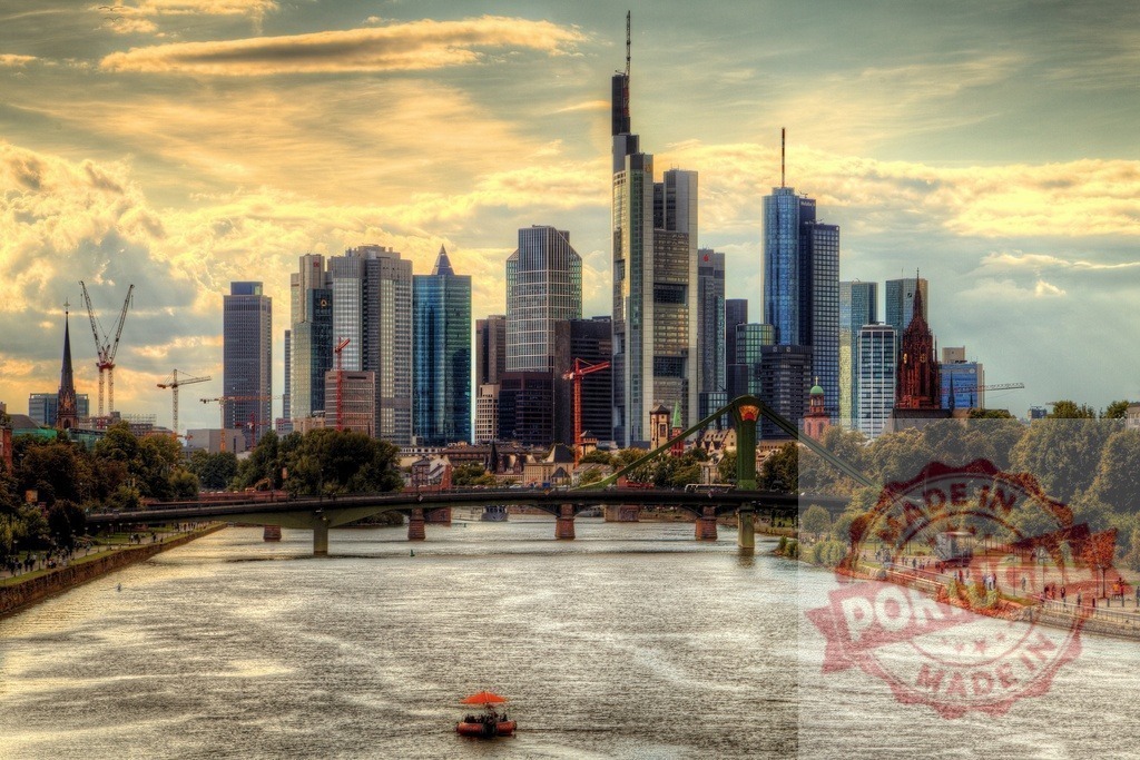 Frankfurt cityscape skyline over Main River at sunset | Frankfurt skyline with modern skyscrapers, bridges, and Main River reflecting sky colors - Realisiert mit Pictrs.com