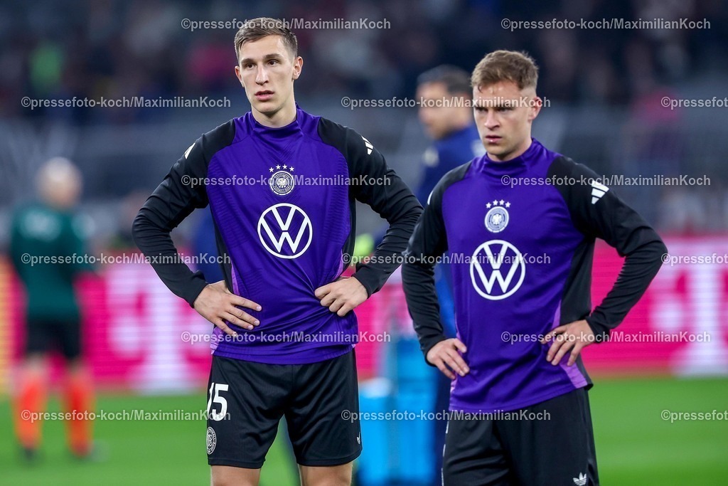 DFB23032502138 | 23.03.2025, Fußball, Viertelfinale UEFA Nations League, Deutschland - Italien, Signal Iduna Park, Saison 2024 2025: Nico Schlotterbeck (GER #15) Joshua Kimmich (GER #06) DFB regulations prohibit any use of photographs as image sequences and or quasi-video.