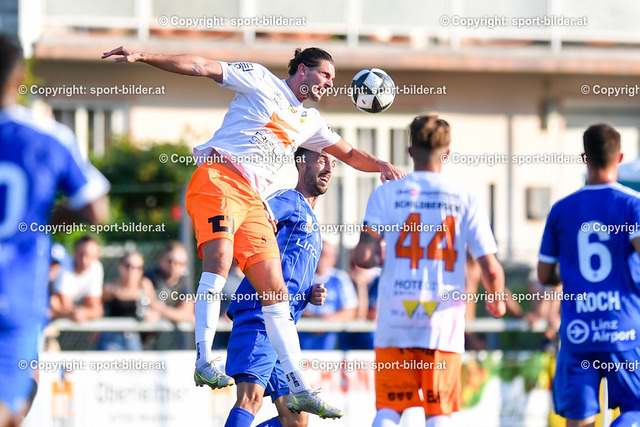 AUT, SPG Wallern / St. Marienkirchen vs FC Blau Weiss Linz | 22.07.2023, Sportplatz Wallern, AUT, OEFB Uniqa Cup, SPG Wallern / St. Marienkirchen vs FC Blau Weiss Linz, im Bild Oliver Affenzeller (Wallern) vs Fabio Strauss (Blau Weiss Linz)



// OEFB Uniqa Cup Match between SPG Wallern / St. Marienkirchen vs FC Blau Weiss Linz in Wallern, Austria on 2023/07/22