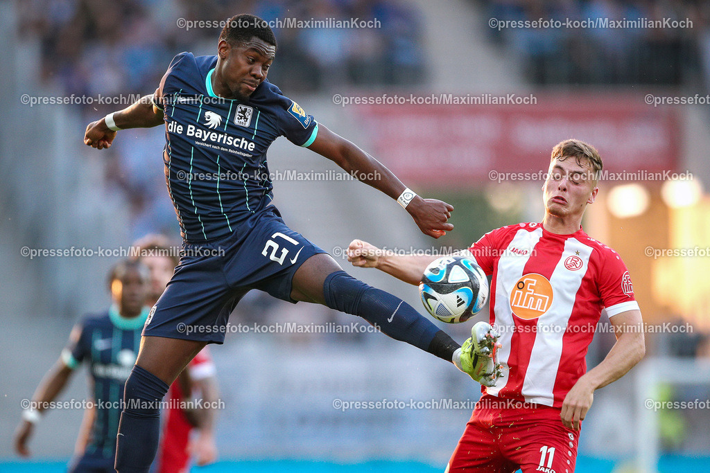 RWE3Liga10052401032 | 10.05.2024, Essen, Fußball, bwin 3. Liga Herren, Stadion an der Hafenstraße, 37. Spieltag Saison 2023 2024, Rot-Weiss Essen – TSV 1860 München:  Leroy Kwadwo (TSV 1860 München) gegen Marvin Obuz (Rot-Weiss Essen). 
DFB regulations prohibit any use of photographs as image sequences and or quasi-video.