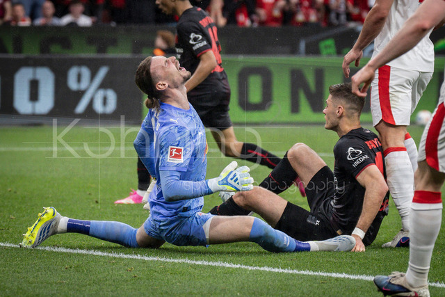 German Bundesliga, Bayer 04 Leverkusen vs. RB Leipzig, 02.05.2026 | LEVERKUSEN, GERMANY - MAY 2, 2026 :  Keeper Maarten Vandevoordt(RB Leipzig, 26) tackled by Patrik Schick (Bayer 04 Leverkusen, 14) during the German Bundesliga match on gameday 32 between Bayer 04 Leverkusen vs. RB Leipzig at BayArena on May 2, 2026 in Leverkusen, Germany. DFL REGULATIONS PROHIBIT ANY USE OF PHOTOGRAPHS AS IMAGE SEQUENCES AND/OR QUASI-VIDEO.
