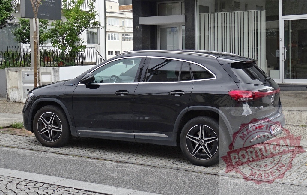 Mercedes-Benz EQA 250 electric SUV parked on street | Black Mercedes-Benz EQA 250 electric SUV parked on a paved street - Realized with Pictrs.com