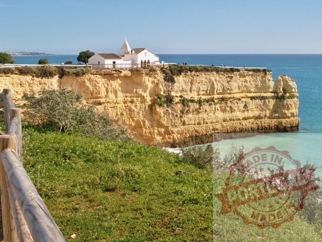 Nossa Senhora da Rocha chapel on Algarve coast cliff | Nossa Senhora da Rocha chapel sitting on a golden cliff overlooking the turquoise Atlantic Ocean - Realized with Pictrs.com