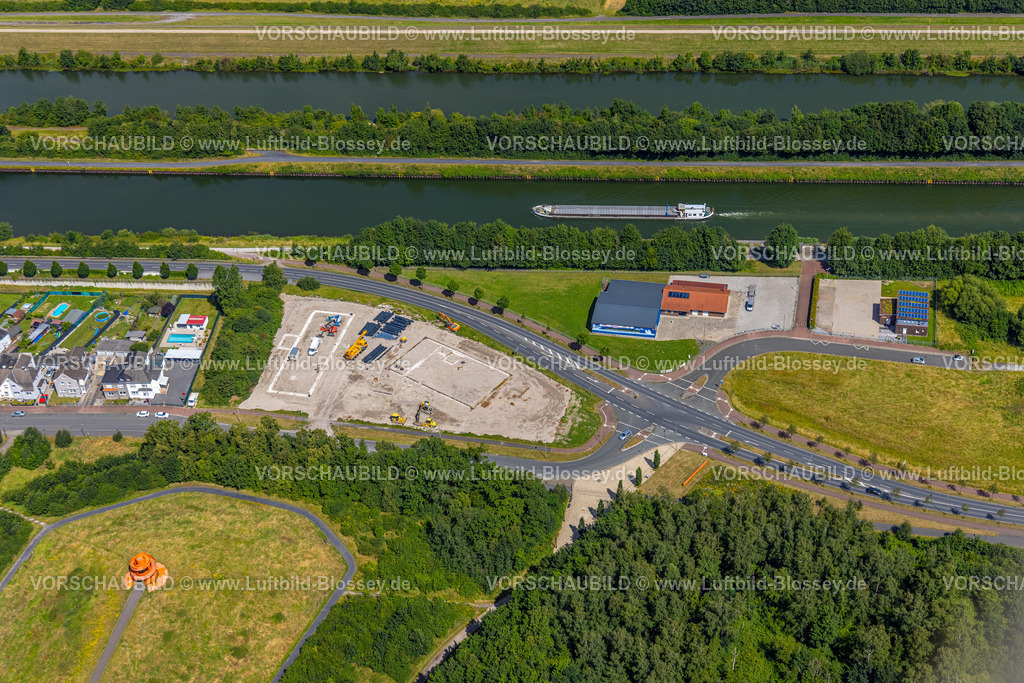 Hamm240706103 | Luftbild, Baustelle für neues Wohnquartier mit Wohnhäusern an der Johannes-Rau-Straße Ecke Lünener Straße, Datteln-Hamm-Kanal Binnenschifffahrt mit Lastenschiff und Gebäude Kanu-Verein 45 Herringen e.V., Stadtbezirk Herringen, Hamm, Ruhrgebiet, Nordrhein-Westfalen, Deutschland