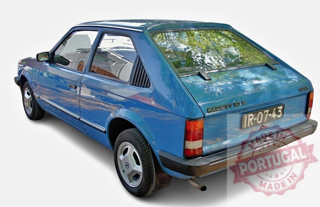 Blue Opel Kadett D vintage hatchback car | Blue Opel Kadett D vintage hatchback automobile parked on white background - Realized with Pictrs.com