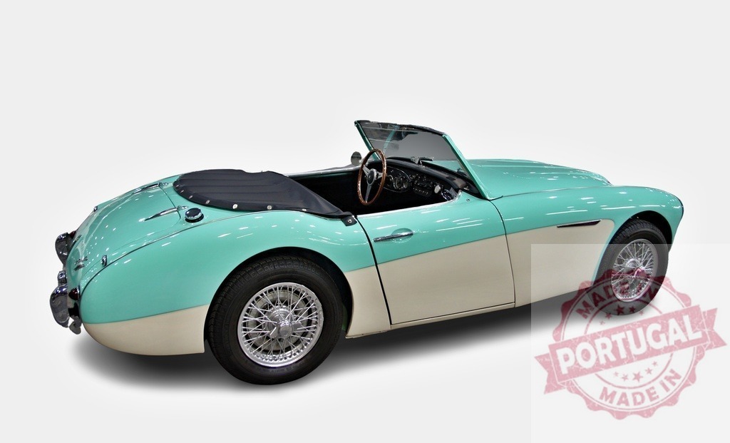 Classic Austin-Healey 3000 Mark II sports car posing on white background | Light green and white Austin-Healey 3000 Mark II convertible vintage car with open roof parked on white background - Realized with Pictrs.com