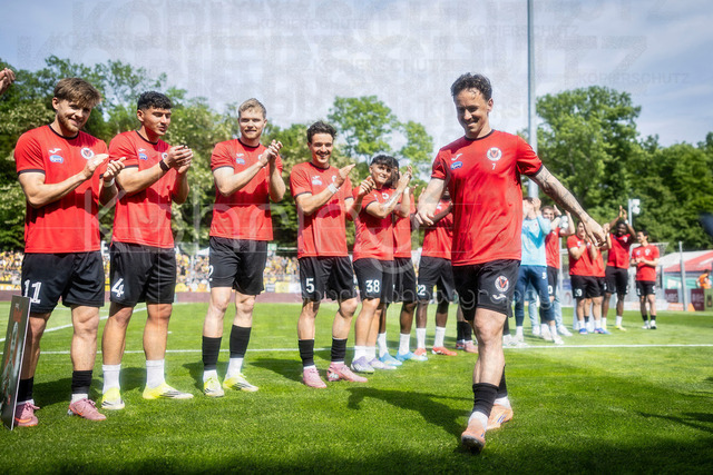 German 3rd Division, Viktoria Koeln vs. Alemannia Aachen, 10.05.2026 | KOELN, GERMANY - MAY 10, 2026:  Farewell of Simon Handle (Viktoria Köln, 7) during the 3rd division match on gameday 37 between Viktoria Koeln vs. Alemannia Aachen at the Sportpark Hoehenberg on May 10, 2026 in Koeln, Germany. DFL REGULATIONS PROHIBIT ANY USE OF PHOTOGRAPHS AS IMAGE SEQUENCES AND/OR QUASI-VIDEO.