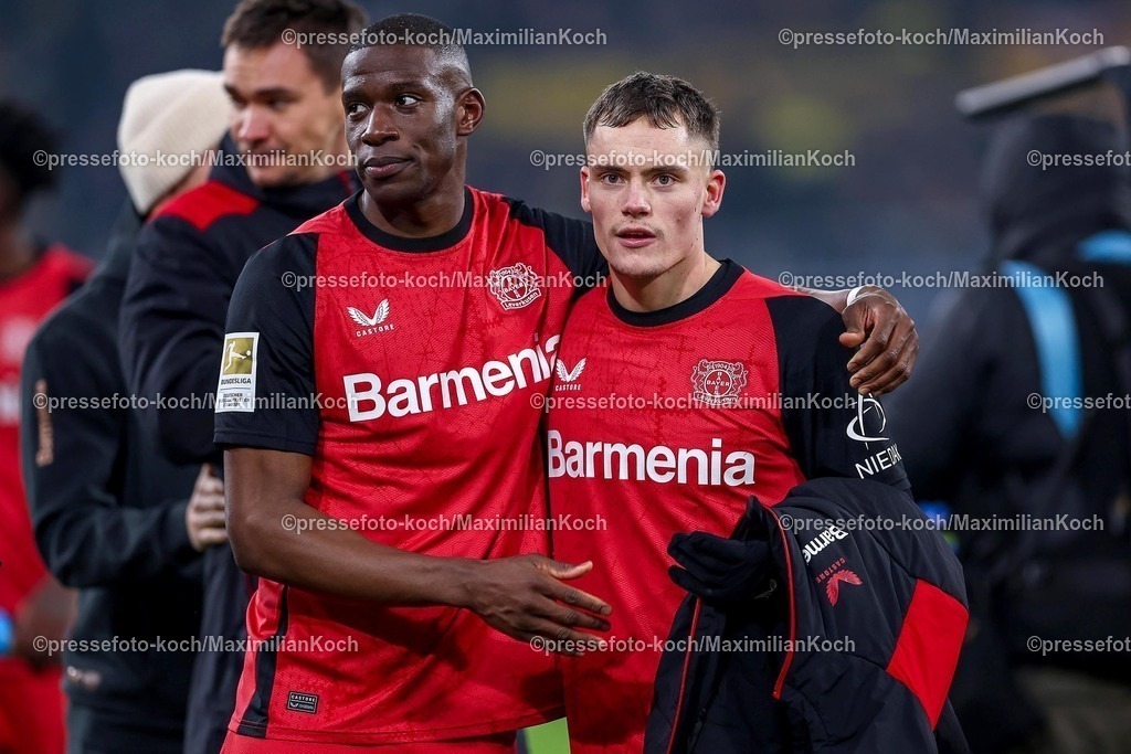 BVB10012502351 | 10.01.2025, Fußball, Borussia Dortmund - Bayer 04 Leverkusen, 1. Fußball Bundesliga, 16. Spieltag, Signal Iduna Park, Saison 2024 2025: Nordi Mukiele (Bayer04 Leverkusen #23) neben Florian Wirtz (Bayer04 Leverkusen #10)DFB regulations prohibit any use of photographs as image sequences and or quasi-video.