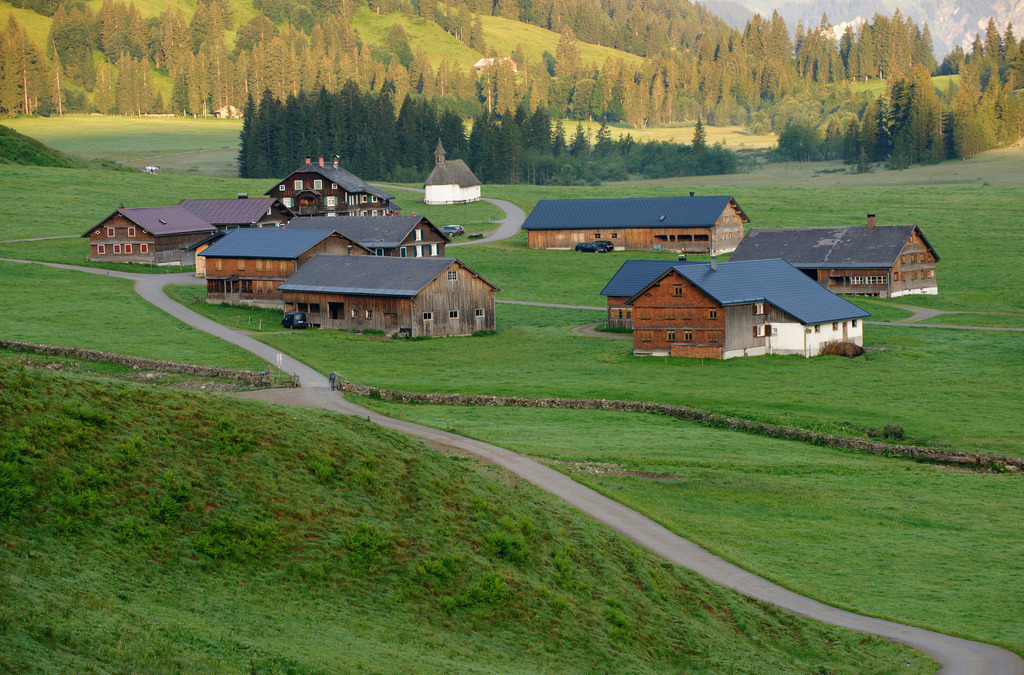 Blick in das Tal Schönenbach | Schoenenbach, Austria - July 24, 2012: Vorsäßsiedlung Schönenbach;  Blick in das Tal Schönenbach mit Häuser und Kapelle. - Realisiert mit Pictrs.com