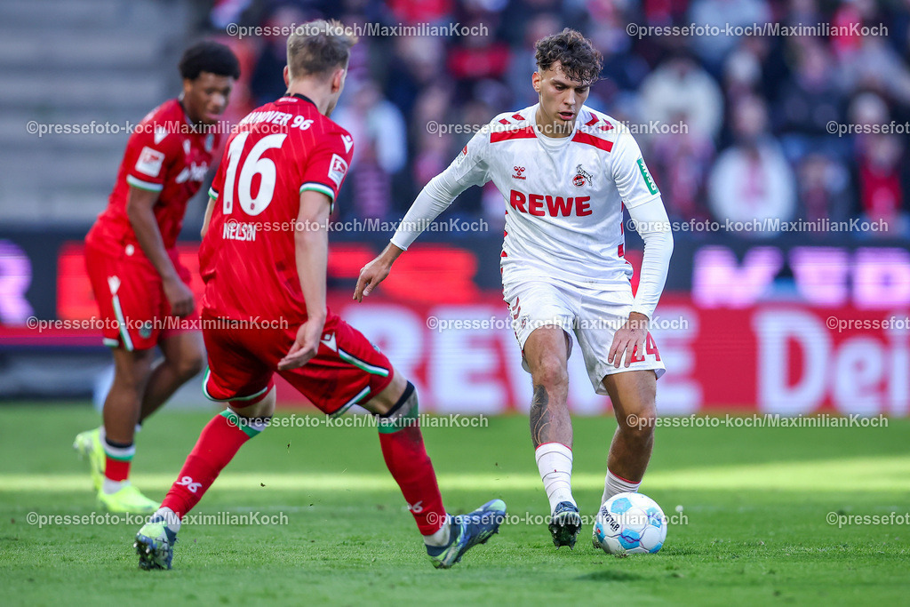 1FC30112402139 | 30.11.2024, Fußball, 1. FC Köln - Hannover 96, 2. Fußball Bundesliga, RheinEnergieSTADION, Saison 2024 2025: Havard Nielsen (Hannover #16) im Zweikampf gegen Julian Pauli (1.FC Köln #24)DFB regulations prohibit any use of photographs as image sequences and or quasi-video.