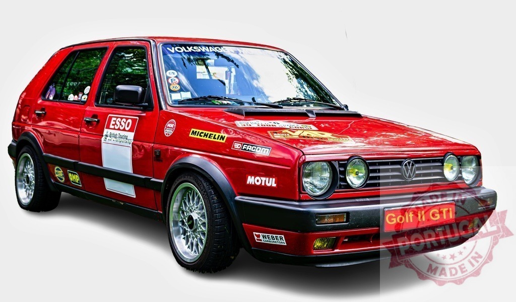 Red Volkswagen Golf II GTI posing with Esso and Michelin stickers | Customized red Volkswagen Golf II GTI posing on a white background, showing Esso, Michelin, Motul, Weber and Facom stickers - Realisiert mit Pictrs.com