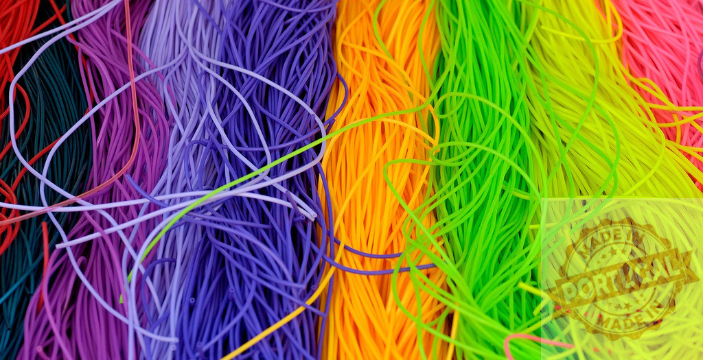 Colorful silicone rubber bands creating a vibrant and playful texture | Colorful silicone rubber bands arranged together, creating a vibrant and playful texture, perfect for arts, crafts, and DIY projects - Realisiert mit Pictrs.com