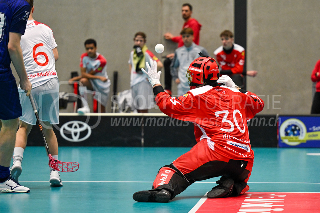 Switzerland U19 vs Finland U19 - 3. February 2024 | Switzerland U19 vs Finland U19
U19 Men International Matches in Switzerland
GoEasy Arena, Siggenthal Station
Switzerland goalie #30 Ilja Brunner defending against an attempt by Team Finland.
Credit: Markus Aeschimann | <a href="https://www.markus-aeschimann.ch">Sportfotografie Markus Aeschimann</a> | <a href="https://www.instagram.com/sportfotografie.aeschimann">@sportfotografie.aeschimann</a> - Realisiert mit Pictrs.com