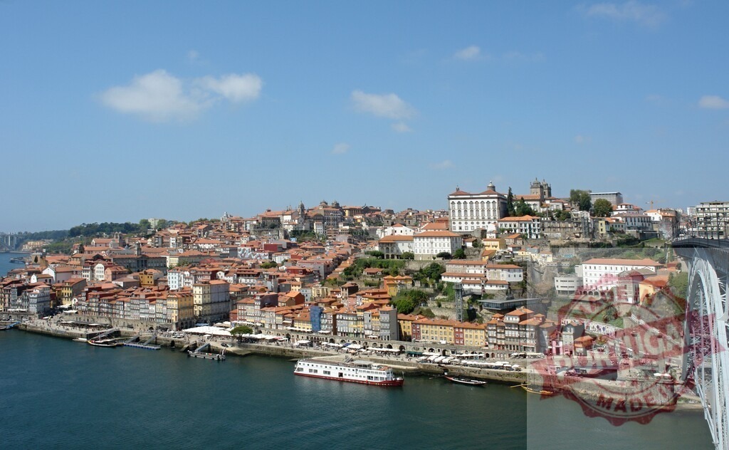 Porto Ribeira district with Douro river and Dom Luís I Bridge | Porto old town cityscape lining the Douro river with traditional buildings and bridge - Realized with Pictrs.com
