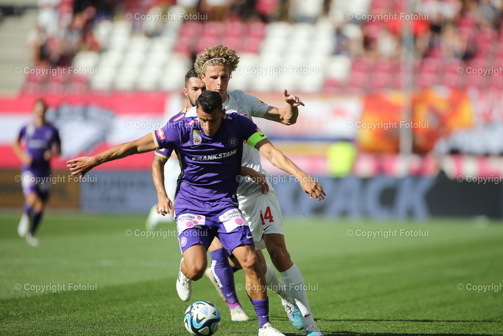 A_LUI_20230813_0024 | SPORT FUSSBALL ADMIRAL BUNDESLIGA RED BULL SALZBURG VS AUSTRIA WIEN
IM BILD: Manfred Fischer (FK Austria Wien), Maurits Kjaergaard (Red Bull Salzburg)
FOTO:FOTOLUI/UW