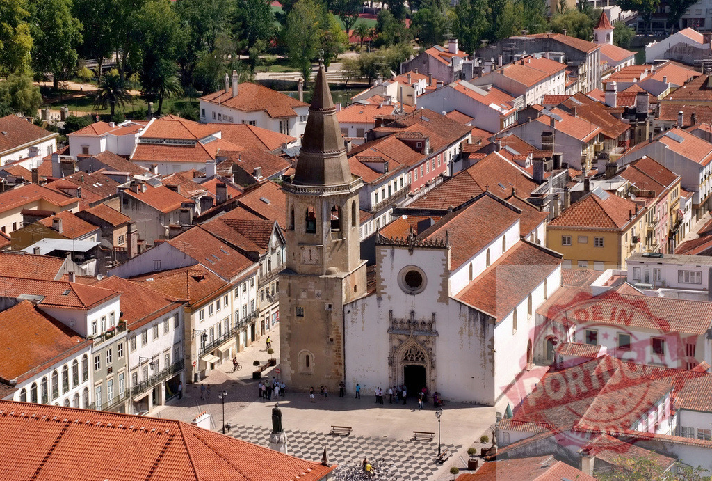 Church of São João Baptista in Tomar, Portugal urban skyline | Tomar cityscape showing Church of São João Baptista and surrounding red roofs from aerial view - Realized with Pictrs.com
