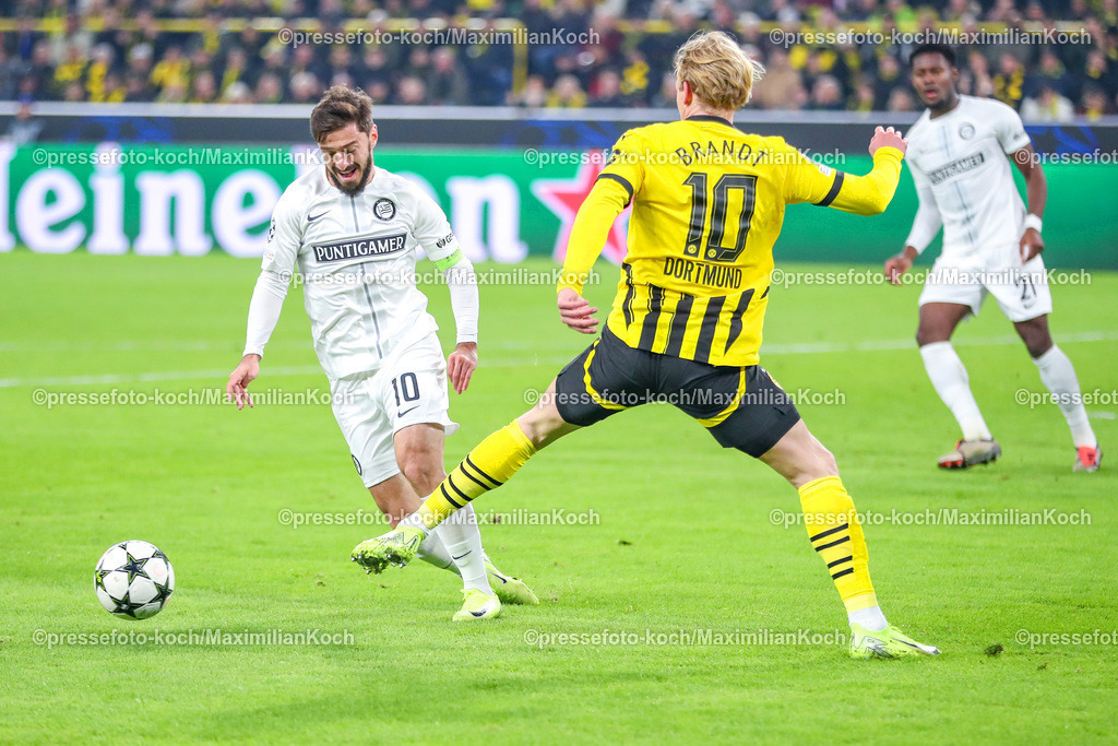 BVB05112401020 | 05.11.2024, Fußball, UEFA Champions League, Borussia Dortmund - SK Sturm Graz, 4. Spieltag, Signal Iduna Park, Saison 2024 2025: Otar Kiteishvili (Graz #10) gegen Julian Brandt (BVB #10)