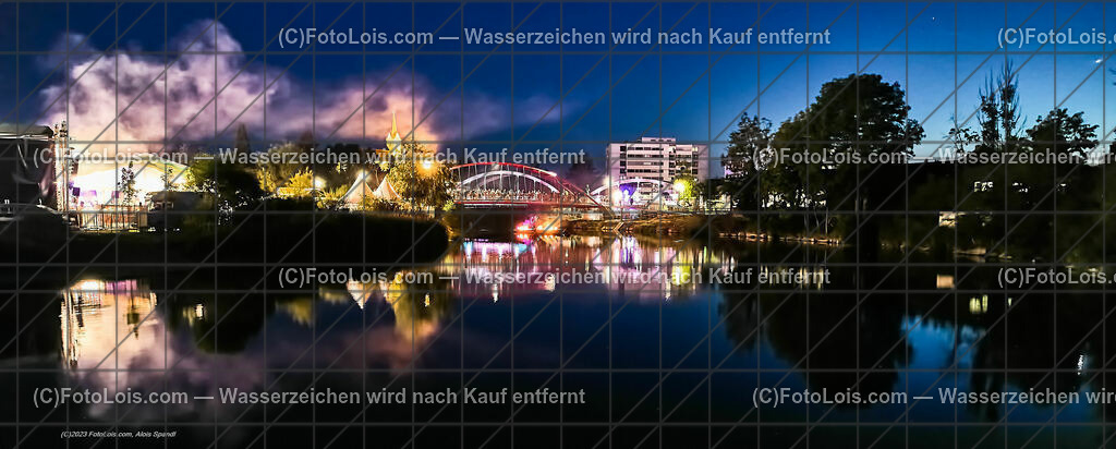 0431_Luftbild_VOLKSFEST-Wlbg_Abend-Lichterstimmung | (C)FotoLois.com, Alois Spandl, Luftbild, Wieselburger VOLKSFEST neu, Feuershow auf der Erlaufinsel unter den Brücken, Do 29. Juni 2023.