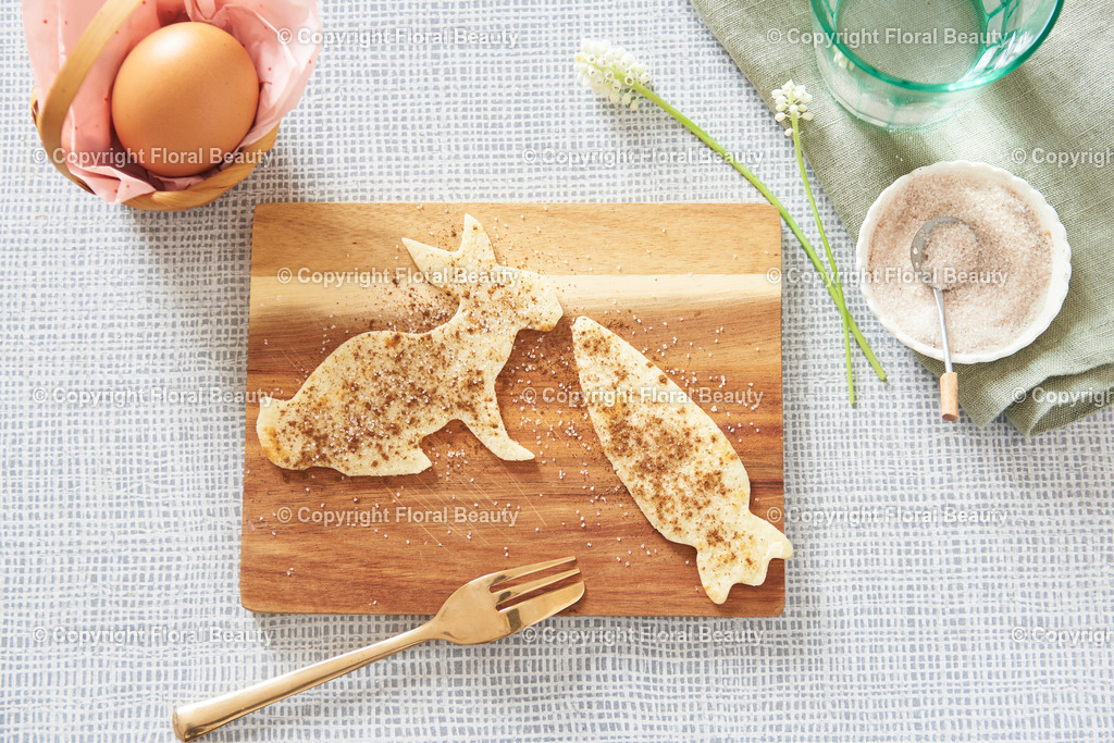 Häschen mit Möhre aus Pfannkuchen | Häschen mit Möhre aus Pfannkuchen ausgestochen mit zimt und Zucker, kindlich - Realisiert mit Pictrs.com