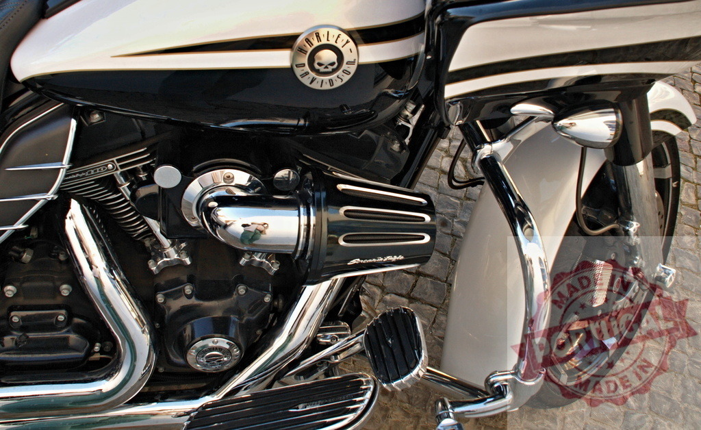 Harley-Davidson motorcycle engine chrome details on cruiser bike | Harley-Davidson motorcycle engine showcasing custom chrome parts and intricate mechanical details - Realized with Pictrs.com