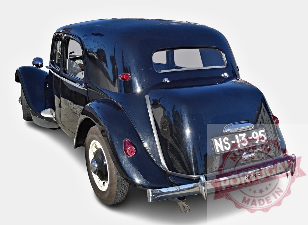 Black Citroën Traction Avant showcasing its vintage elegance | Classic black Citroën Traction Avant parked, highlighting its timeless design and historical significance - Realized with Pictrs.com