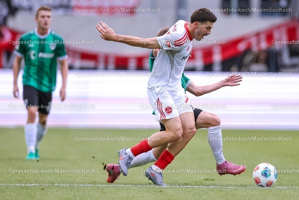 PRM22082501044 | 22.08.2025, Fußball, Preußen Münster - 1. FC Nürnberg, 2. Fußball Bundesliga,  Preußenstadion, Saison 2025 2026: Luka Lochoshvili (1FC Nuernberg #24) im Zweikampf gegen  Joshua Mees (Preussen Muenster #08)  DFB regulations prohibit any use of photographs as image sequences and or quasi-video.