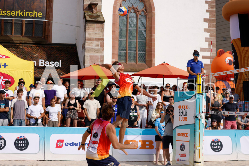 Obi BeachTour 2026 - Basel | BASEL, SWITZERLAND - JULY 19: LUC EMANUEL FLÜCKIGER (SUI) attack / spike during the Obi BeachTour 2026 match between DILLIER / FLÜCKIGER (SUI) and BREER / KÄLIN (SUI) at Barfüsserplatz on July 19, 2026 in Basel, Switzerland. - Realisiert mit Pictrs.com