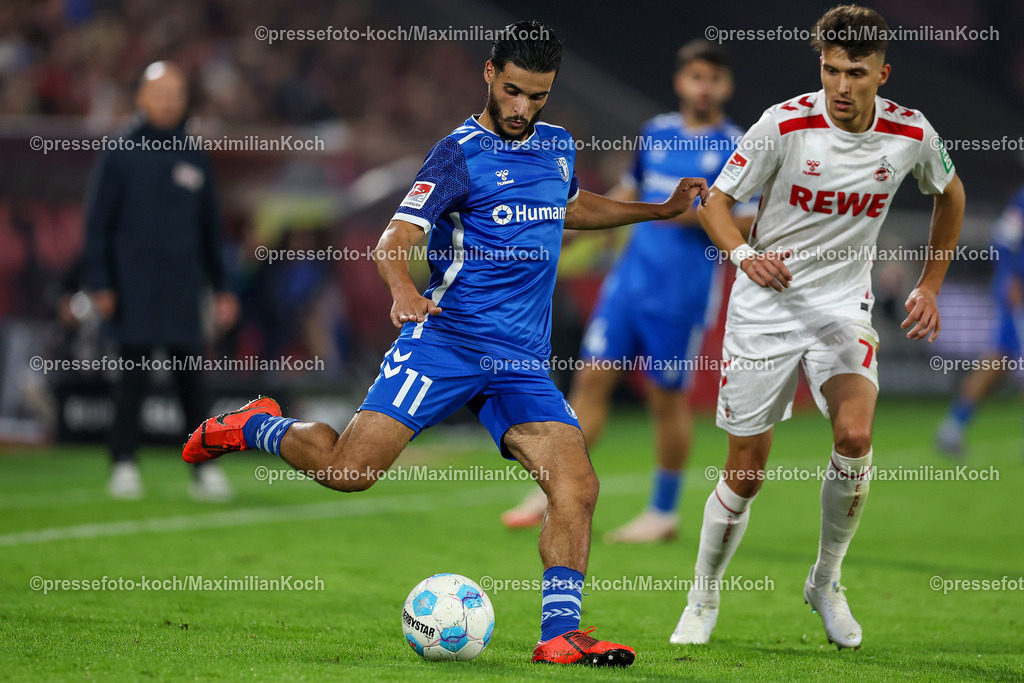 Koe14092402165 | 14.09.2024, 2. Fußball Bundesliga, 1. FC Köln - 1. FC Magdeburg, RheinEnergieSTADION, Saison 2024 2025: Mohammed El Hankouri (1.FC Magdeburg #11) gegen Dejan Ljubicic (1.FC Köln #7)DFB regulations prohibit any use of photographs as image sequences and or quasi-video.