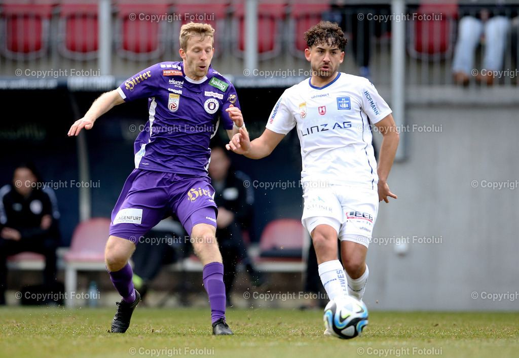A_LUI_25022024_16 | SPORT,FUSSBALL, ADMIRAL BUNDESLIGA AUSTRIA KLAGENFURT - BLAU WEISS LINZ 25.02.2024 IM BILD :CHRISTOPHER CVETKO  (KLAGENFURT) UND MARCO KRAINZ   (BLAUWEISSLINZ) FOTO:FOTOLUIMW