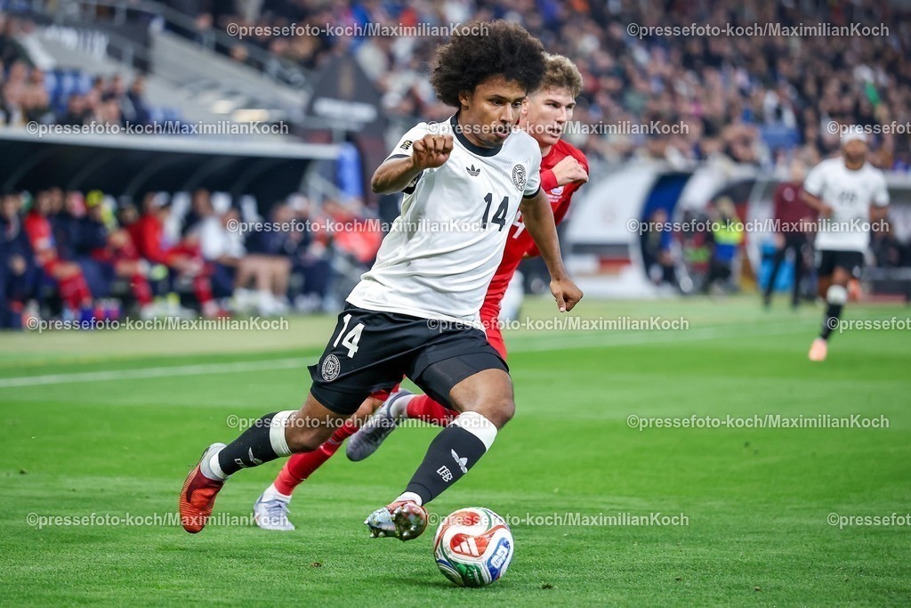 DFB10102501083 | 10.10.2025, Fußball, Länderspiel, Deutschland - Luxemburg, UEFA WM-Qualifikation, 2025/2026, Gruppe A, PreZero Arena in Sinsheim: Karim Adeyemi (GER #14) DFB regulations prohibit any use of photographs as image sequences and or quasi-video.