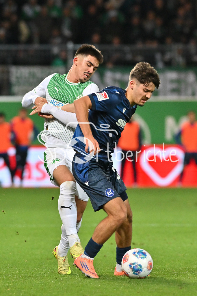 SpVgg Greuther Fürth - Karlsruher SC | FUERTH, GERMANY - OCTOBER 24: Rafael PINTO PEDROSA (Karlsruher SC 36) against Aaron KELLER (SpVgg Greuther Fuerth 16) during the 2. bundesliga match between SpVgg Greuther Fuerth vs. Karlsruher SC on matchday 10 at Sportpark Ronhof Thomas Sommer on October 24, 2025 in Fuerth, Germany / DFL REGULATIONS PROHIBIT ANY USE OF PHOTOGRAPHS AS IMAGE SEQUENCES AND/OR QUASI-VIDEO