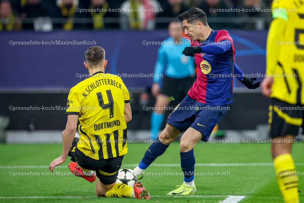 UCL11122402246 | 11.12.2024, UEFA Champions League, Borussia Dortmund - FC Barcelona, 8. Spieltag, Signal Iduna Park, Saison 2024 2025: Nico Schlotterbeck (BVB #4) im Zweikampf gegen Robert Lewandowski (Barca #9)