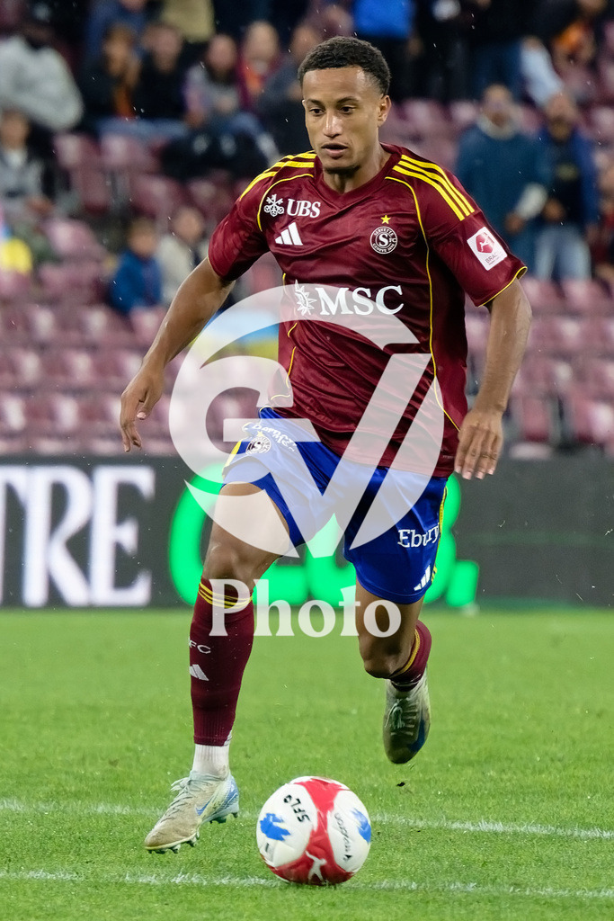 UEFA Conference League Play-offs 2nd leg - Servette FC v FC Shakhtar Donetsk | Lilian Njoh (14 Servette FC) controls the ball (action)  during the UEFA Conference League Play-offs 2nd leg match between Servette FC and FC Shakhtar Donetsk at Stade de Geneve in Geneva, Switzerland
