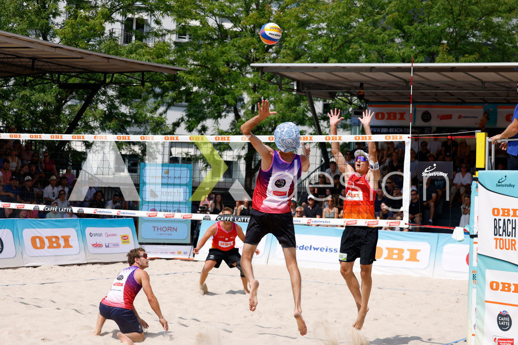 Obi BeachTour 2026 - Basel | BASEL, SWITZERLAND - JULY 19: SIMON HAGENBUCH (SUI) attack / spike during the Obi BeachTour 2026 match between HAGENBUCH / HAUSSENER (SUI) and LEITNER / KINDL (AUT) at Barfüsserplatz on July 19, 2026 in Basel, Switzerland. - Realisiert mit Pictrs.com