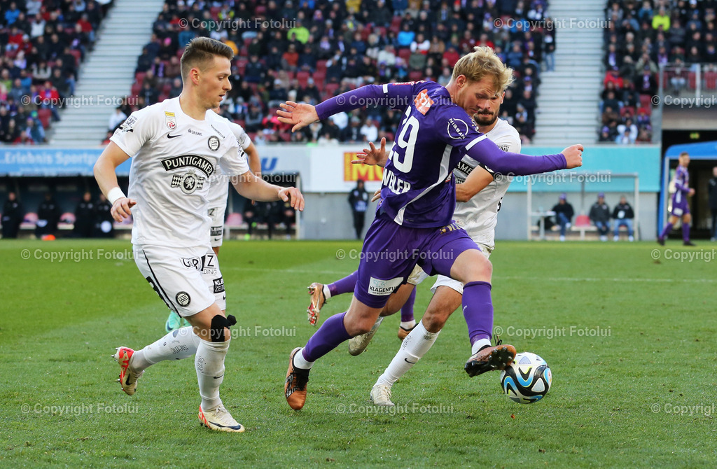 A_LUI_121123_16 | SPORT,FUSSBALL,ADMIRAL BUNDESLIGA AUSTRIA KLAGENFURT-STURM GRAZ 12.11.2023IM BILD:DIMITRI LAVALEE  (STURM GRAZ ) UND JONAS ARWEILER (KLAGENGURT)FOTO: FOTOLUI