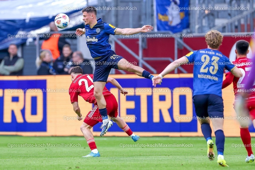 F9510042601024 | 10.04.2026, Fußball, Fortuna Düsseldorf - Holstein Kiel, 2. Fußball Bundesliga, Herren, Merkur Spiel-Arena, 29. Spieltag, Saison 2025 2026: David Zec&nbsp; (Holstein Kiel #26) im Zweikampf gegen  Florent Muslija&nbsp;(Fortuna Düsseldorf #24)   DFB regulations prohibit any use of photographs as image sequences and or quasi-video.