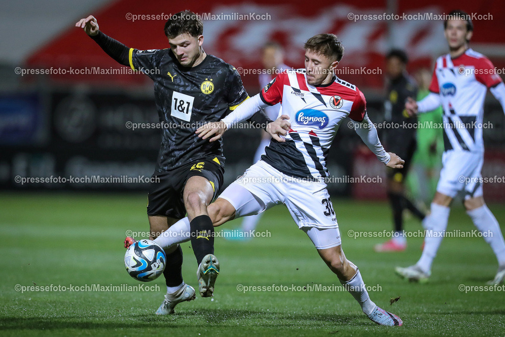 Koe3Liga09022401012 | 09.02.2024, Köln, Fußball, bwin 3. Liga Herren, Sportpark Höhenberg, 25. Spieltag, Saison 2023 2024, FC Viktoria Köln – FC Viktoria Köln – Borussia Dortmund II: Antonis Aidonis (Borussia Dortmund II) verteidigt gegen Luca Marseiler (Viktoria Köln). 
DFB regulations prohibit any use of photographs as image sequences and or quasi-video.