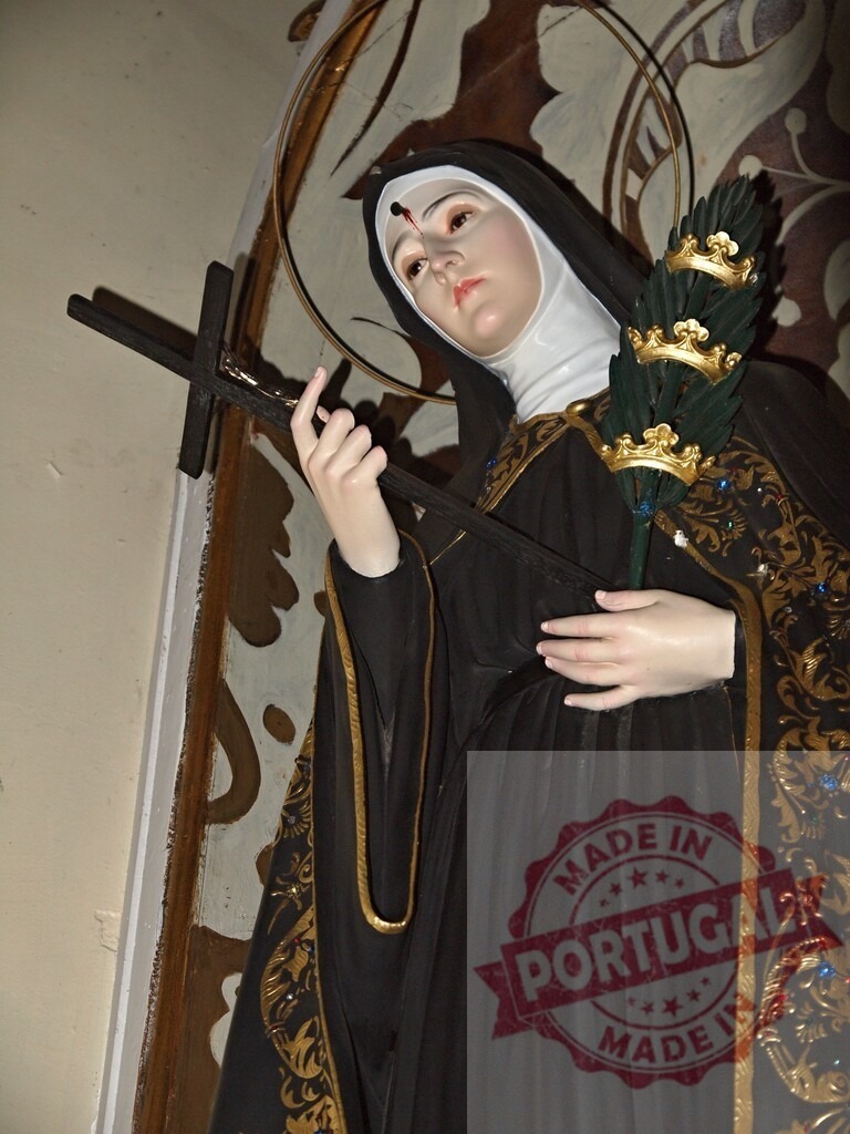 Saint Rita of Cascia statue holding crucifix and palm | Saint Rita of Cascia statue portraying the nun with stigmata and religious symbols - Realisiert mit Pictrs.com
