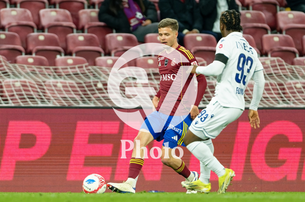 Brack Super League - Servette FC v FC Lausanne-Sport | Teo Alix (34 Servette FC) in action (close up)  under pressure of Sekou Fofana (93 FC Lausanne-Sport) during the Brack Super League match between Servette FC and FC Lausanne-Sport at Stade de Geneve in Geneva, Switzerland