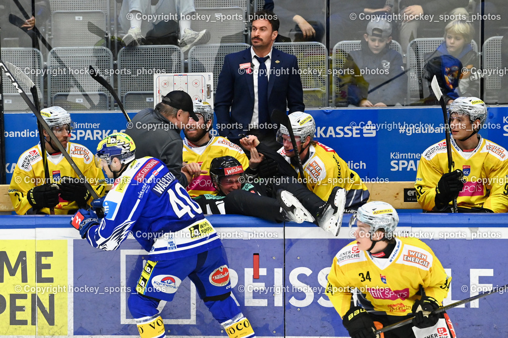 EC IDM WÄRMEPUMPEN VSV vs. Vienna Capitals | Equipment Manager Vienna Capitals Thomas Bardodej, Individualtrainer Vienna Capitals Rafael Rotter, #40 Elias Wallenta EC VSV, RIECKEN SIMON Referee, Referee sturtz auf die Spielerbank, EC IDM WÄRMEPUMPEN VSV vs. Vienna Capitals, EC IDM WÄRMEPUMPEN VSV vs. Vienna Capitals am 16.11.2025 in Villach (Stadthalle Villach), Austria, (Photo by Bernd Stefan)