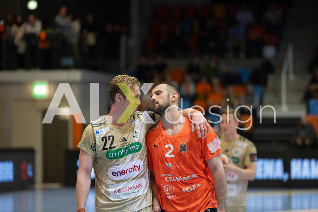 Handball I Herren I Saison 2025-2026 I EHF EUROPEAN LEAGUE 2025/26 | Men I Main Round I 2. Spieltag I Kadetten Schaffhausen - TSV Hannover-Burgdorf I 24.02.2026 | 22 Marian Michalczik (DE) (TSV Hannover-Burgdorf) – Rückraum mitte  //  2 Lucas Meister (CH) (Kadetten Schaffhausen) – Kreisläufer - Realisiert mit Pictrs.com