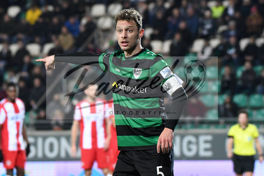 20200214_SCPFWK_0079 | Fussball, Herren: Julian Schauerte (SC Preussen Muenster) gestikuliert waehrend des Spiels der 3. Liga zwischen SC Preussen Muenster und FC Wuerzburger Kickers im Preussenstadion am 14.02.2020 in Muenster, Deutschland.DFB / DFL REGULATIONS PROHIBIT ANY USE OF PHOTOGRAPHS AS IMAGE SEQUENCES AND/OR QUASI-VIDEO. - Realisiert mit Pictrs.com