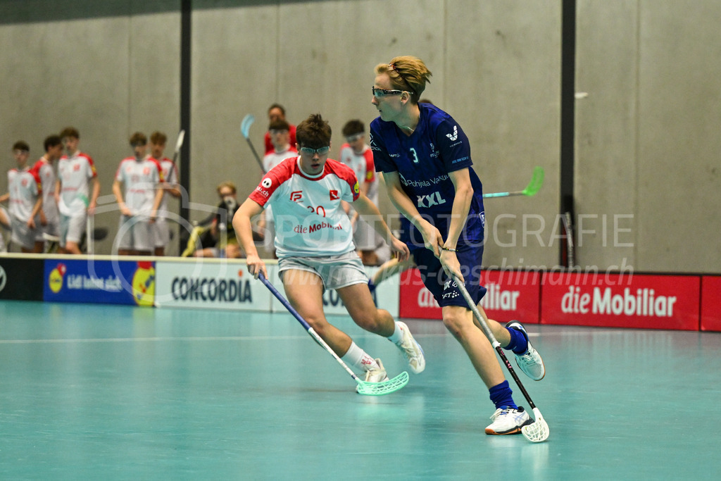 Switzerland U19 vs Finland U19 - 3. February 2024 | Switzerland U19 vs Finland U19
U19 Men International Matches in Switzerland
GoEasy Arena, Siggenthal Station
Finland forward #3 Artturi Hyvärinen in front of Switzerland forward #20 Rovin Thalmann.
Credit: Markus Aeschimann | <a href="https://www.markus-aeschimann.ch">Sportfotografie Markus Aeschimann</a> | <a href="https://www.instagram.com/sportfotografie.aeschimann">@sportfotografie.aeschimann</a> - Realisiert mit Pictrs.com