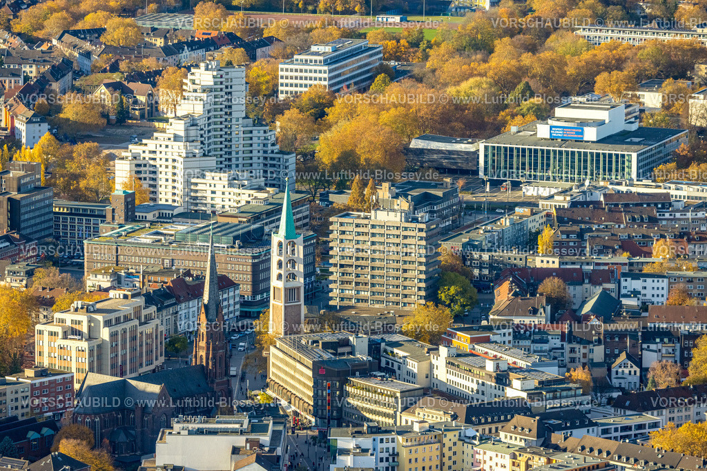 Gelsenkirchen251103042 | Luftbild, Altstadtkirche und Probsteikirche St. Augustinus am Heinrich-König-Platz, Blick zum City-Hochhaus und zum Musiktheater im Revier Gelsenkirchen (MiR), Altstadt, Gelsenkirchen, Ruhrgebiet, Nordrhein-Westfalen, Deutschland