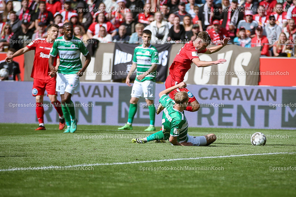 RWE3Liga25052401036 | 25.05.2024, Essen, Fußball, Finaltag der Amateure, Niederrheinpokal Finale, Stadion an der Hafenstraße, Saison 2023 2024, Rot-Weiss Essen – SC Rot-Weiß Oberhausen: Spielszene Foul im Strafraum. Sascha Voelcke (Rot-Weiss Essen) wird von Tim Stappmann (RW Oberhausen) gefoult - Elmeter für RWE zum 2:0. 
DFB regulations prohibit any use of photographs as image sequences and or quasi-video.