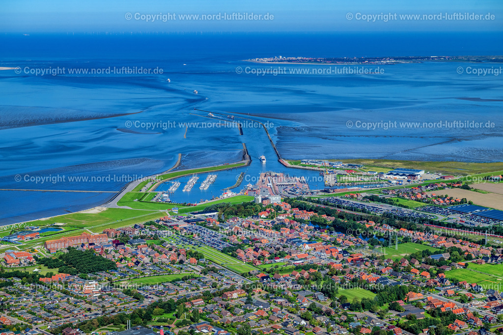 Norddeich_Hafen_ELS_7105050923 | NORDEN 05.09.2023 Hafengebiet" Norddeich Mole " in Norden Nordeich im Bundesland Niedersachsen, Deutschland. Weiterführende Informationen bei: Albert Fischer GmbH,  DB Netz AG,  Deutsche Bahn AG,  Niedersachsen Ports GmbH & Co. KG,  Reederei Norden-Frisia AG. // Port area "Norddeich Mole" in Norden Nordeich in the state Lower Saxony, German. Further information at: Albert Fischer GmbH,  DB Netz AG,  Deutsche Bahn AG,  Niedersachsen Ports GmbH & Co. KG,  Reederei Norden-Frisia AG. Foto: Martin Elsen