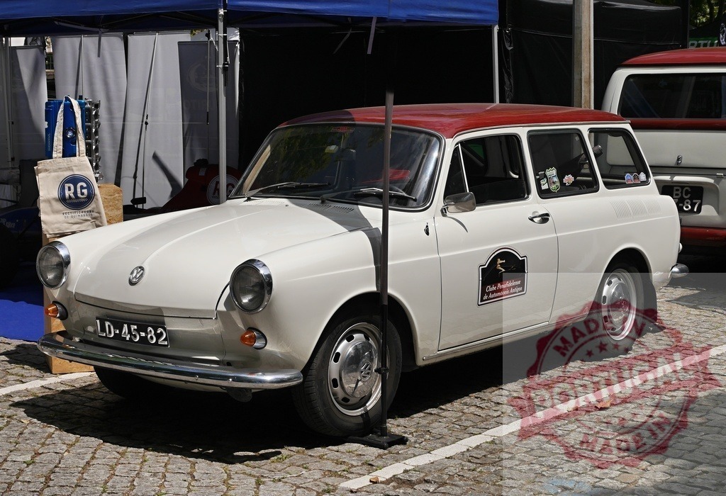 Volkswagen Type 3 Variant vintage car at show | Volkswagen Type 3 Variant station wagon parked on cobblestones during a classic car exhibition - Realized with Pictrs.com
