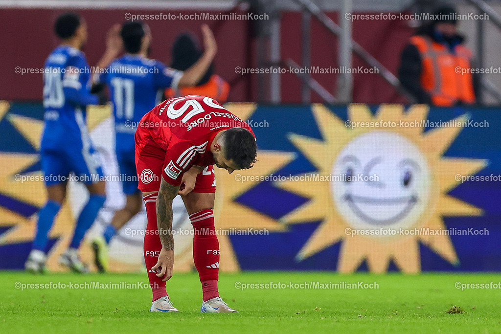 Due20122401108 | 20.12.2024, Fußball, Fortuna Düsseldorf - 1. FC Magdeburg, 2. Bundesliga, Merkur Spiel-Arena, Saison 2024 2025: Matthias Zimmermann (Fortuna Düsseldorf #25) steht enttäuscht auf dem SpielfeldDFB regulations prohibit any use of photographs as image sequences and or quasi-video.