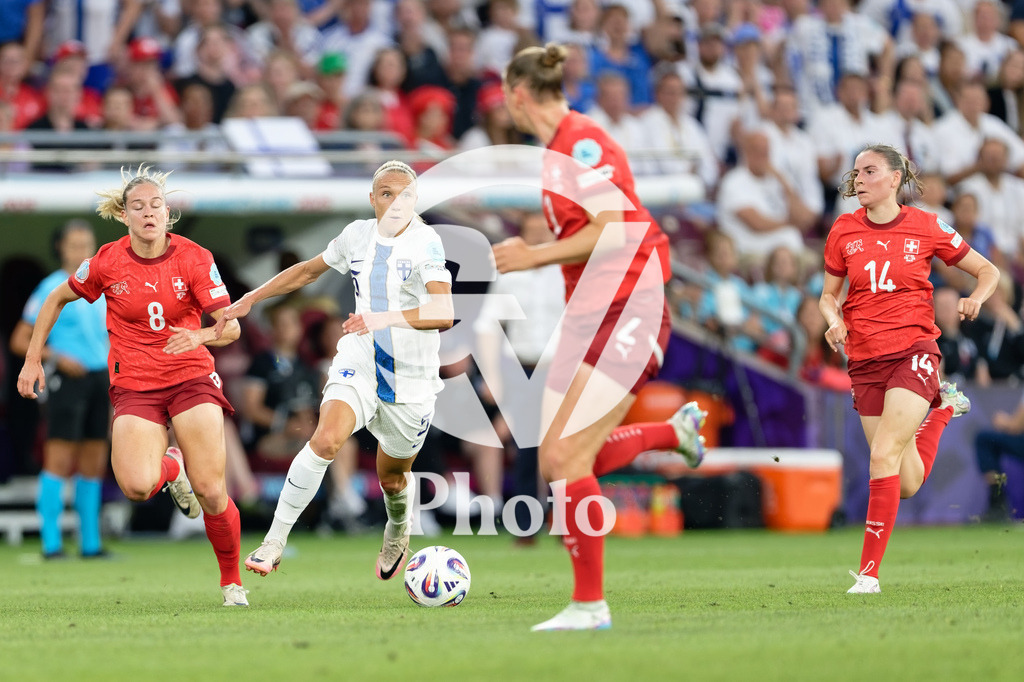 Finland v Switzerland: UEFA Women's EURO 2025 Group A | GENEVA, SWITZERLAND - JULY 10: Emma Koivisto of Finland under pressure from Nadine Riesen of Switzerland Smilla Vallotto of Switzerland Julia Stierli  during the UEFA Women's EURO 2025 Group A match between Finland and Switzerland at Stade de Geneve on July 10, 2025 in Geneva, Switzerland. (Photo by Giuseppe Velletri/Sports Press Photo/Getty Images)