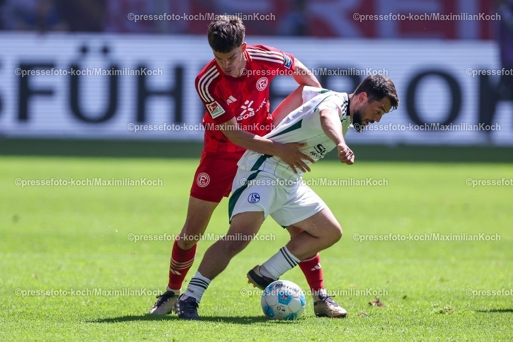 F9510052501026 | 10.05.2025, Fußball, Fortuna Düsseldorf - FC Schalke 04, 2. Fußball Bundesliga, Merkur Spiel-Arena, Saison 2024 2025: Giovanni Haag (Fortuna Duesseldorf #6) im Zweikampf gegen Amin Younes (Schalke04 #8) DFB regulations prohibit any use of photographs as image sequences and or quasi-video.